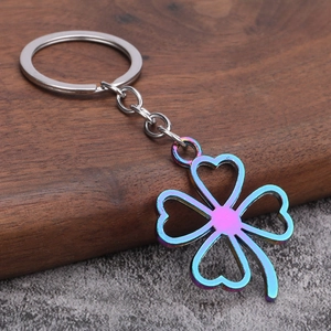 Chameleon hollow four-leaf clover keychain with iridescent gradient metal finish