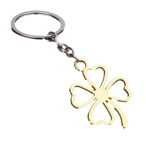 Minimalist four-leaf clover keychain with gold and silver dual-tone metal finish