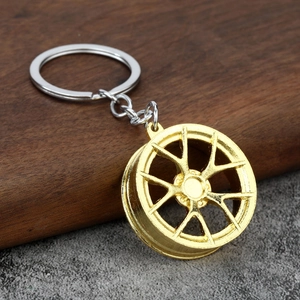 Creative gold car wheel rim keychain with premium alloy finish and metal ring