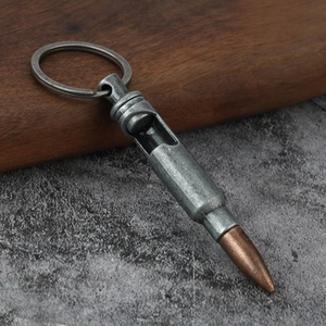 Macro detail of bullet shaped bottle opener keychain with vintage metal texture