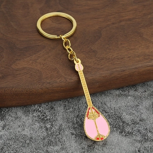 Exquisite golden alloy Pipa musical instrument keychain with pink enamel details