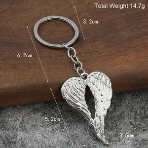 Silver heart angel wings keychain with dimensions 6.2cm and 14.7g weight info