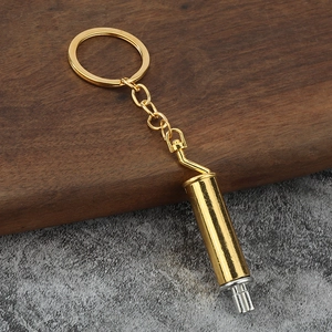 Polished gold exhaust pipe keychain creative car tuning accessory for automotive enthusiasts