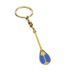 Golden alloy musical instrument keychain with blue enamel and intricate filigree patterns