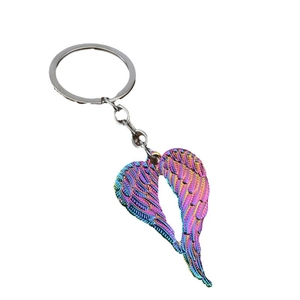Rainbow plated heart angel wing keychain with minimalist carved feather pendant details