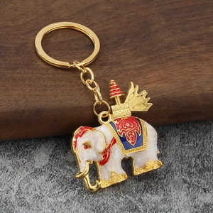 Detailed Thai style white elephant keychain with gold plating and colorful enamel work