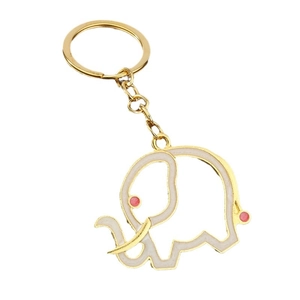 Minimalist golden elephant keychain featuring cream enamel finish and pink accents