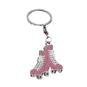 Pink retro roller skates keychain made of zinc alloy with white lace details
