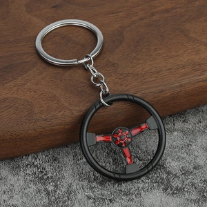 Portachiavi a forma di volante da corsa nero e rosso in metallo stile sportivo