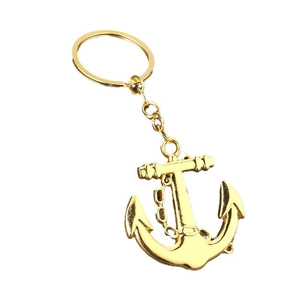 Golden anchor keychain with decorative chain and polished ring in a nautical style