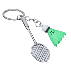 Badminton racket and shuttlecock keychain in silver and bright green on white background