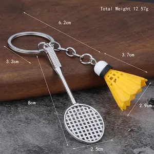Badminton racket and shuttlecock keychain set with silver metal ring and yellow ball