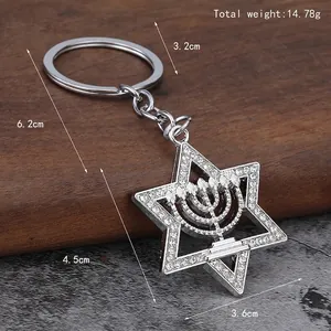 Star of David keychain with Menorah pendant and white rhinestones on wood and stone