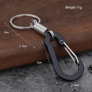 Multifunctional black aluminum carabiner keychain with 11g weight and measurement details