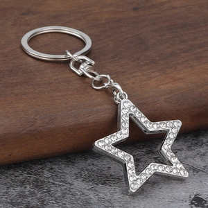 Sparkling star keychain with clear rhinestones on silver metal frame for accessories