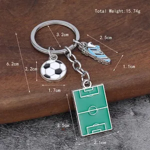 Soccer keychain set with mini football, blue shoe and green field charms, weighing 15.74g