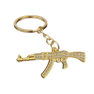 Golden AK-47 rifle keychain with sparkling crystals in punk hip hop style for men and women