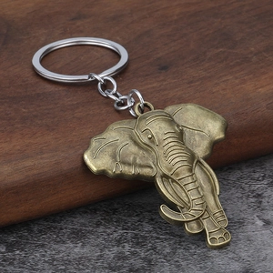 Macro shot of vintage elephant keychain with detailed antique bronze metal carvings