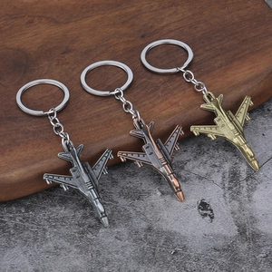 Three-piece metal aircraft fighter jet keychains in silver, bronze and gold vintage finish