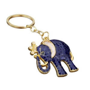 Blue enamel elephant keychain with gold crown detail on a polished metal ring and chain