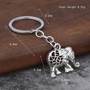 Silver elephant keychain with hollow floral pattern and 6.2cm total length