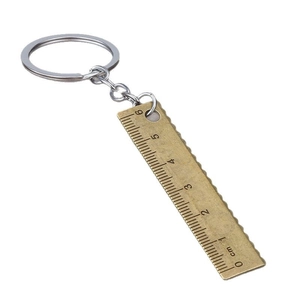Porte-clés mini règle en métal couleur laiton avec graduation métrique de 6 cm