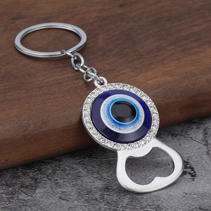 Blue Evil Eye keychain bottle opener with sparkling rhinestones and polished alloy finish