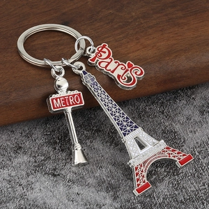 Paris themed metal keychain with colorful Eiffel Tower and Metro sign pendants