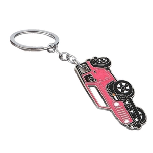 Pink off-road truck keychain featuring detailed metal car pendant and silver keyring