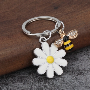 Gänseblümchen und Bienen Schlüsselanhänger mit Strasssteinen und silbernem Metallring
