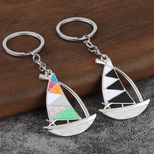Lot de porte-clés voilier avec émail coloré et détails d'étoile de mer en métal