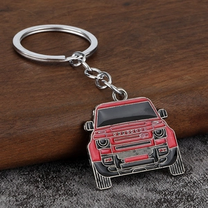 Red off-road car enamel keychain with metallic ring shown from a 45-degree angle