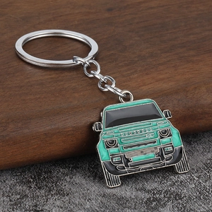Zinc alloy car-shaped keychain with mint green enamel finish and silver key ring accessory