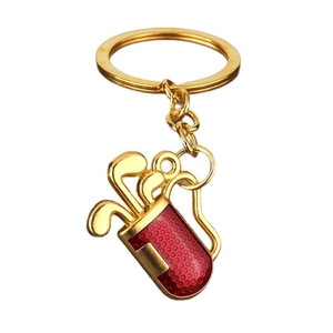 Golden golf bag keychain with red club set design and textured metallic finish