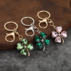 Creative crystal clover keychain with heart-shaped rhinestones in multiple colors