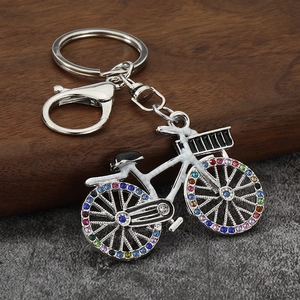 Sparkling rhinestone bicycle keychain with colorful stones on silver metal bike charm