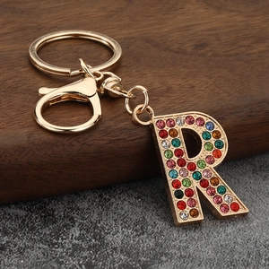 Detail of letter R keychain with colorful crystals and gold metal lobster clasp