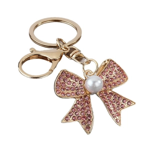 Pink rhinestone bow keychain with white faux pearl and gold plating for women's bags