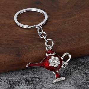 Traditional Aladdin magic lamp keychain with red enamel and sparkling crystal accents