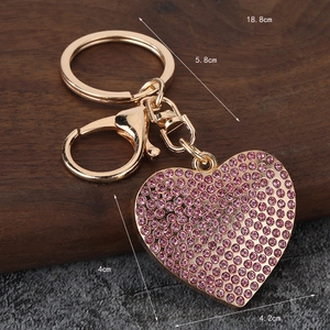 Sparkling pink rhinestone heart keychain with gold alloy lobster clasp and size markers
