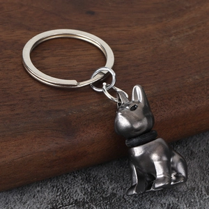 Minimalist French Bulldog metal keychain with vintage silver finish and black collar