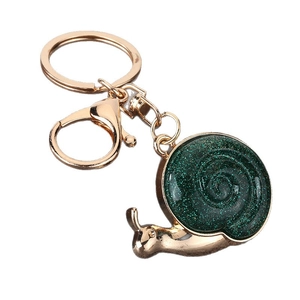Golden snail keychain with resin shell and lobster clasp for bags and car keys