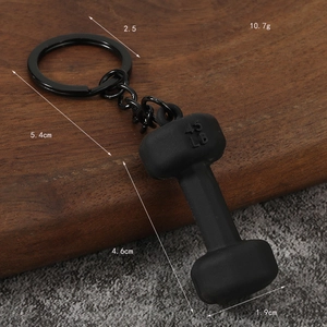 Creative fitness dumbbell keychain in matte black finish with 45 LB engraving detail
