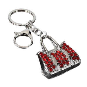 Elegant silver alloy keychain with a red rhinestone tote bag pendant and lobster clasp