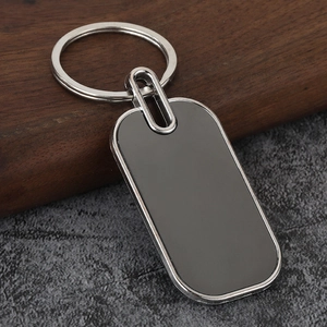 Detail of silver metal bottle opener keychain with blank sublimation insert on stone