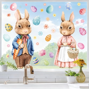 Easter bunny window clings with anthropomorphic rabbits and colorful eggs on glass