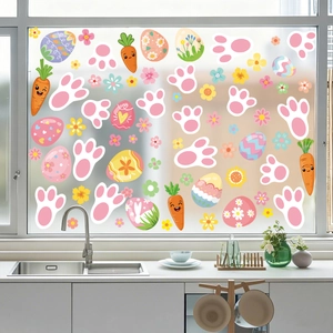 Colorful Easter egg and carrot static window clings on a modern glass kitchen window