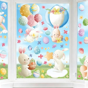 Detailed watercolor Easter bunny window stickers on glass with clear blue sky background