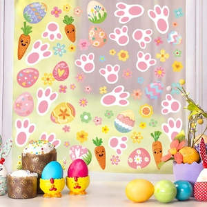 Easter window stickers featuring colorful eggs and carrots on a clear glass window decoration