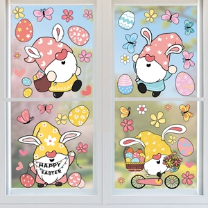 Easter window clings set with Happy Easter gnomes and eggs on glass window panel